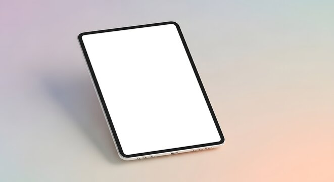A modern tablet device with a blank white screen placed on a smooth, neutral-colored surface, showcasing technology and digital interface concepts