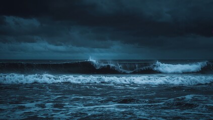 Dark and Stormy Ocean Waves Under Cloudy Sky at Dusk