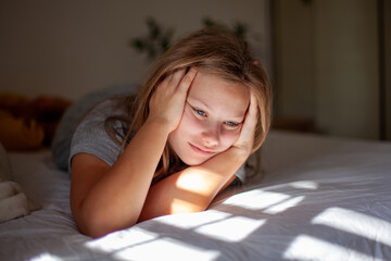 Sad and frustrated Teenage Girl  in Bed in the Morning