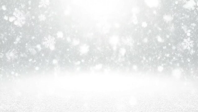 Snowflakes falling on a white background with sparkling light, perfect for winter and holiday themes.