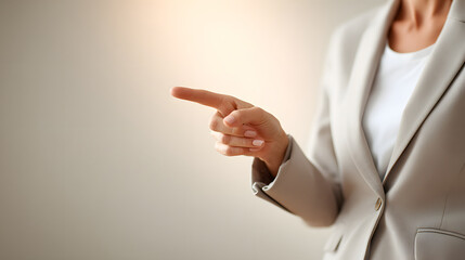 A woman's hand pointing to the side, showcasing the concept of direction and guidance
