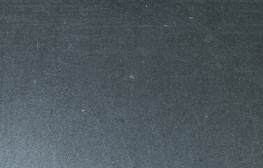 Dark grainy plastic texture full frame background