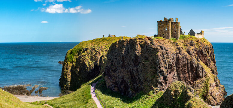 Stonehaven, Aberdeenshire, Scotland, United Kingdom: aerial and panoramic view of the magnificent Dunnottar Castle, a ruined medieval fortress on a rocky headland in the northeast coast
