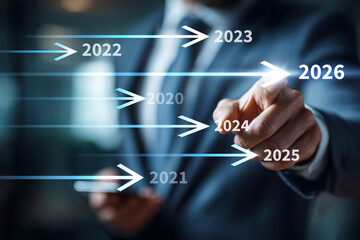Businessman hand pointing at digital glowing arrows rising up. Concept of business growth, financial success, stock market upward trend, and progress.