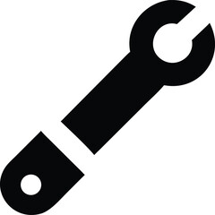 Black slotted spanner tool shows the mechanical utility of repair work equipment on a white background