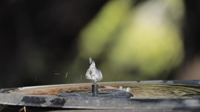 Water Flowing From A Solar Fountain
