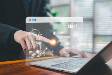 A futuristic Chat AI interface displayed above a laptop as a hand interacts with digital elements, representing artificial intelligence communication, automation, smart technology, and modern virtual