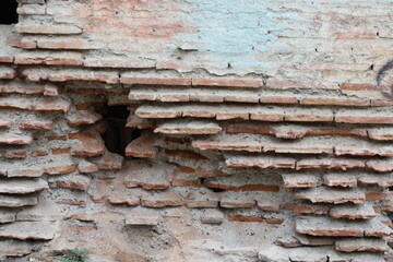 Weathered Red Brick Wall of Old House
