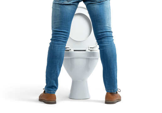 Man’s legs in jeans standing before a toilet on transparent background. Symbol of bathroom routine, hygiene and daily habits. Clean composition for sanitation, home lifestyle and light humor visuals