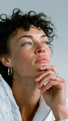 Woman pondering future with thoughtful expression