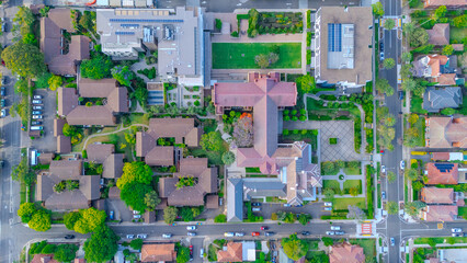 Naklejka premium Aerial Panorama Drone View of a inner western Sydney Suburb of Ashbury Urban Sprawl and the terracotta roof tops streets and trees of Suburban Sydney NSW Australia
