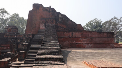 Fototapeta premium India, Bihar, Rajgir, View of Ancient Ruins of Worlds Oldest Nalanda University, The Red Brick Monuments With Ruin Buddha Vihara's Around Campus.