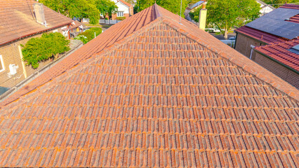 Naklejka premium Aerial Panorama Drone View of a inner western Sydney Suburb of Ashbury Urban Sprawl and the terracotta roof tops streets and trees of Suburban Sydney NSW Australia