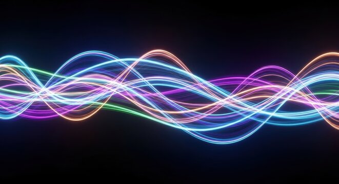 Vivid multicolored light trails flowing against a dark background illustrating digital data or