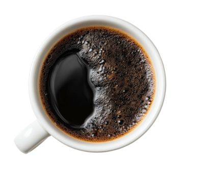 Overhead view of a white mug filled with dark, frothy coffee