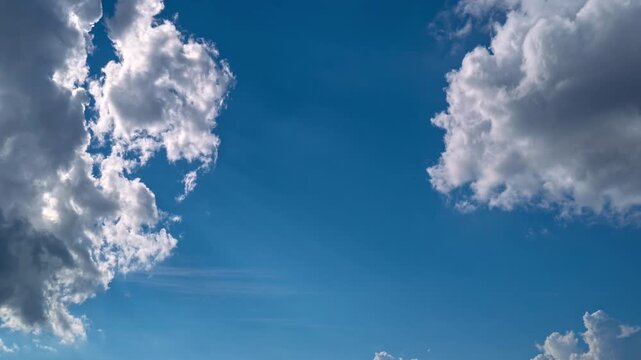 Sky time lapse. Cumulonimbus cloud movement. Moving clouds and sun. 4K Time lapse. The Sky with clouds. Cloud cloudscape time-lapse. Blue sky time lapse. Nature weather with blue sky.