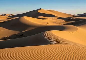 Golden sand dunes under bright sky