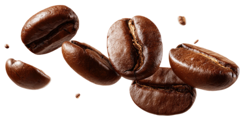 Several roasted coffee beans are suspended in mid-air, isolated on a black background