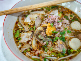 Thai Pork Noodle Soup Bowl with Meatballs Egg and Green Onions Asian Street Food