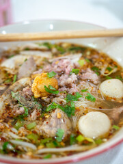 Thai Pork Noodle Soup Bowl with Meatballs Egg and Green Onions Asian Street Food