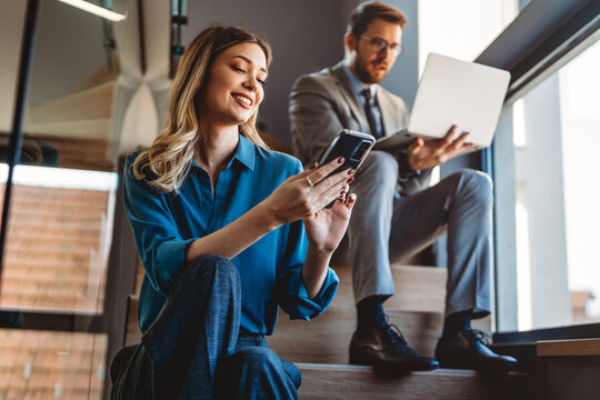 A modern business team uses technology, digital workflow, online tools, and workplace innovation