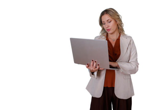 Businesswoman standing, holding a laptop, working and managing her online business, transparent background - Powered by Adobe