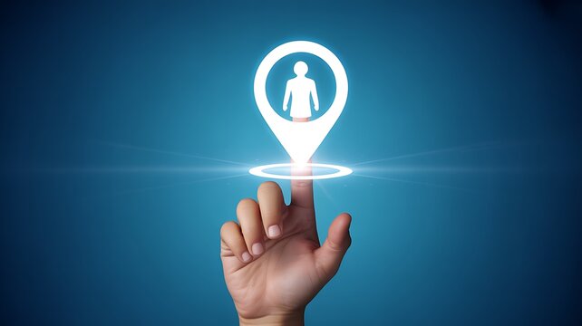 A hand touching a glowing location pin with a person icon inside it.