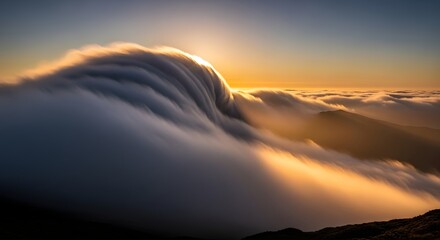 A breathtaking view of a mountain landscape during sunset with dramatic cloud formations and warm golden light illuminating the scene