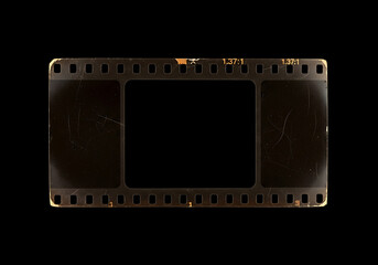 Old, blank projector film frame isolated on black background with copy space, vintage film and analog media