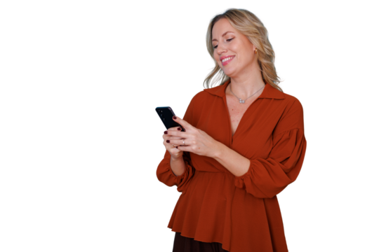 Woman engaging with smartphone, typing messages, checking social media, browsing, connecting online with a happy expression