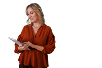 Professional woman smiling, using a digital tablet for business communication, standing on transparent background