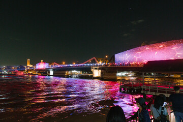 Bangkok's Memorial Bridge (Saphan Phut) during the 'VIJIT CHAO PHRAYA 2025' light and drone show. A...