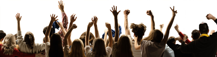 Fototapeta premium Collage of diverse audience cheering with raised hands in celebratory mood on transparent background. Concept of festivals, events, crowd engagement, positive emotion. 11 models