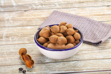 Tropical exotic Tamarind fruit heap