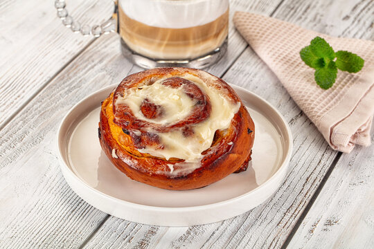 Glazed cinnabon swirl with icing - Powered by Adobe