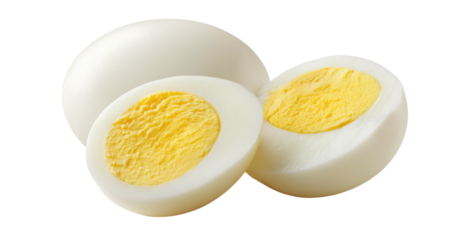 Two hard-boiled eggs, one whole, one halved, revealing yolk