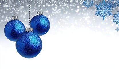 a white background with three blue christmas ornaments hanging on it, snowflakes falling in the upper right corner of the image, leaving space for text at the bottom left. 