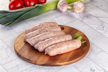 Raw pork sausages for grill