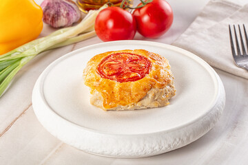 Chicken chop cutlet with cheese and tomato