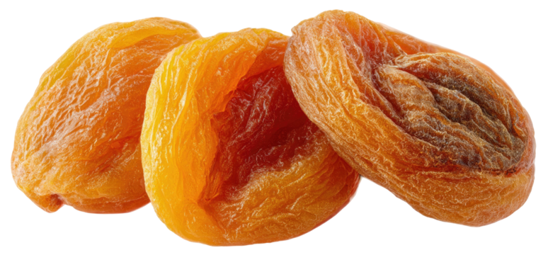 Three dried apricots arranged closely together on a dark background