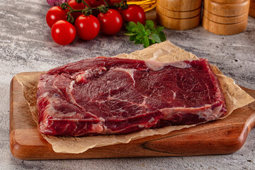 Gourmet raw rib eye steak