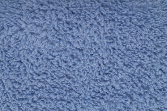 Soft blue fuzzy sherpa fleece fabric background