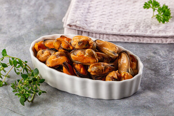 Peeled mussels heap in the bowl