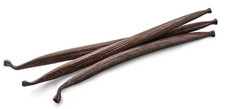 Vanilla beans or vanilla sticks on white background. File contains clipping paths.