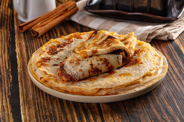 Thin homemade golden pancaces stack