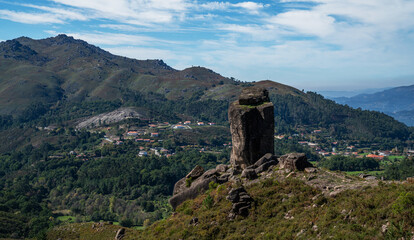 Geres Mountains of Portugal. Breathtaking landscape with rolling green hills and the striking Pedra...