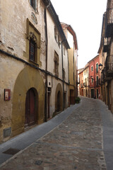 Obraz premium medieval street in the old town of Angles (Carrer Major), La Selva, Girona province, Catalonia, Spain