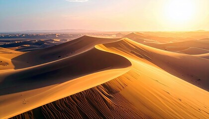 Vast desert landscape with rolling sand dunes bathed in the warm glow of a setting sun.