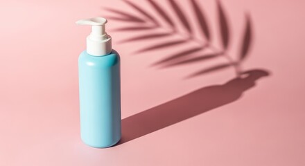Light blue lotion bottle with palm leaf shadow on a pink background