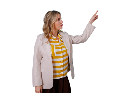 Businesswoman pointing index finger, presenting information or choosing on a virtual screen, looking to the side